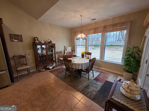 a view of a livingroom with furniture window and outside view