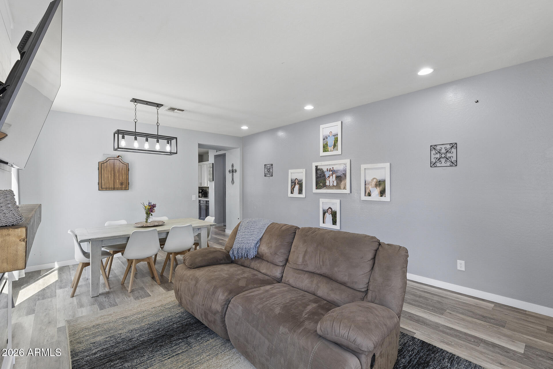 6848 West Ridgeline Road Peoria, AZ 85383 - Photo 11 of 71 a living room with furniture and a table