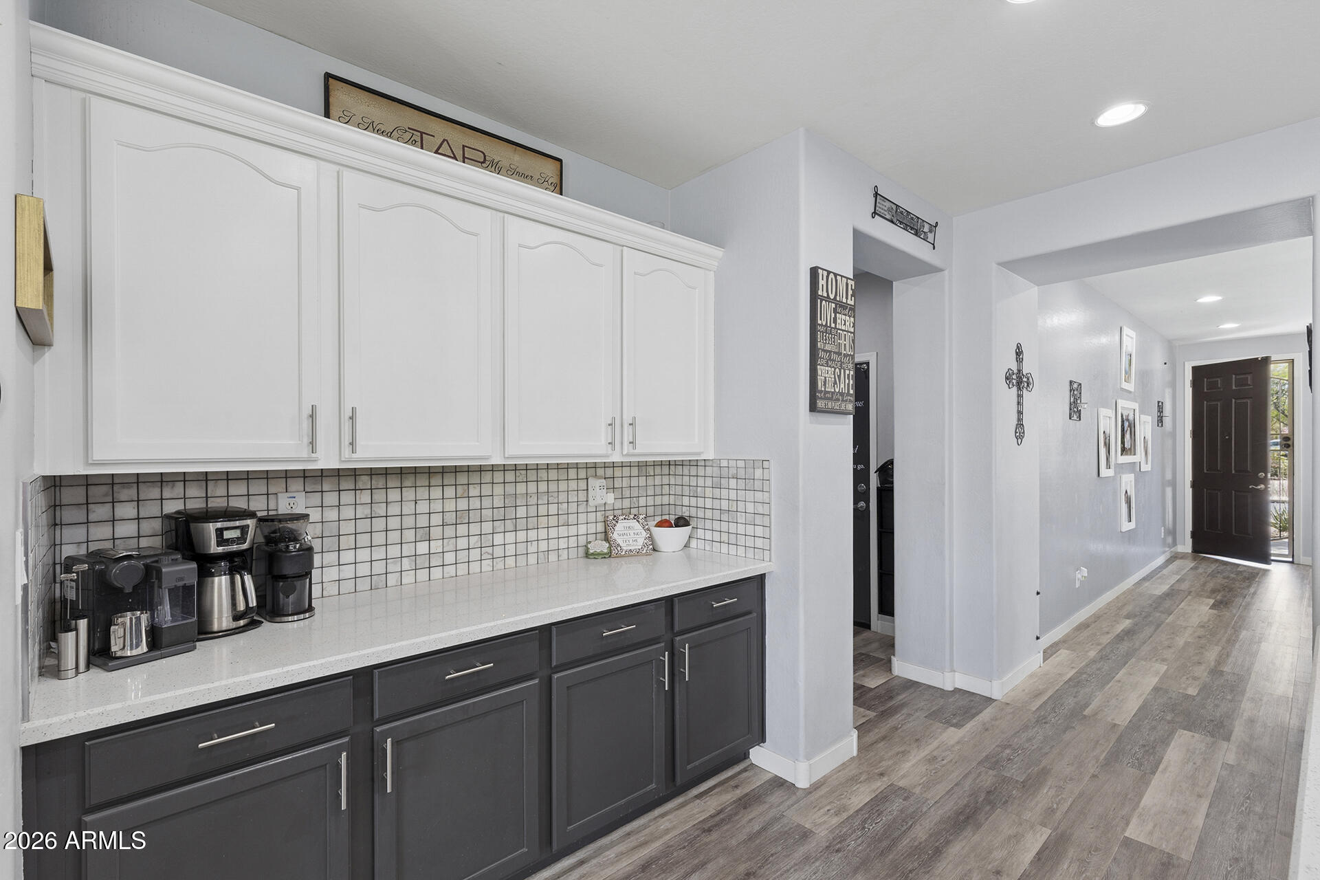 6848 West Ridgeline Road Peoria, AZ 85383 - Photo 18 of 71 a kitchen with a sink and cabinets