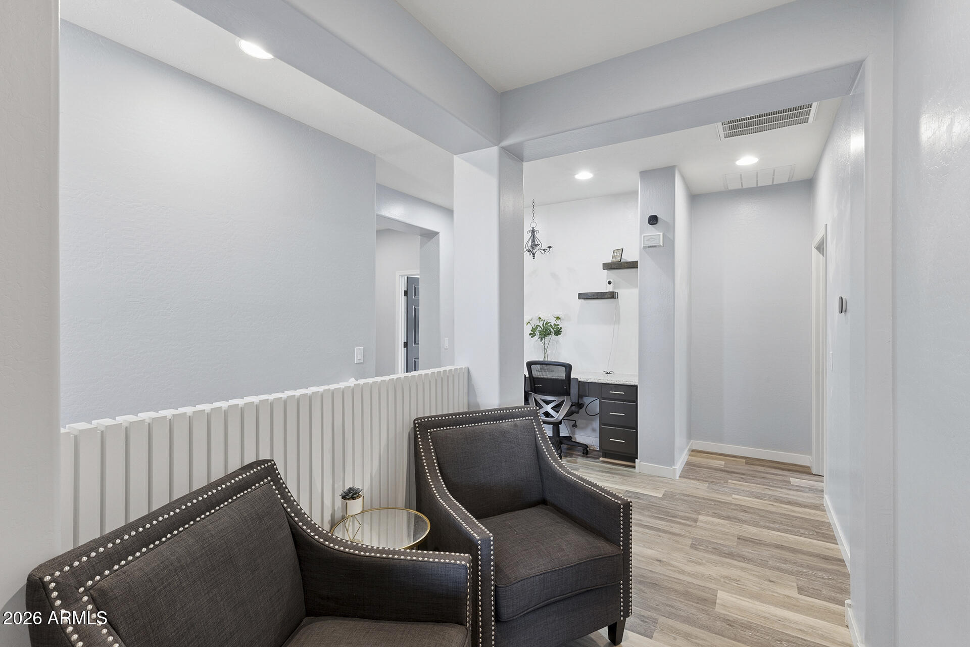 6848 West Ridgeline Road Peoria, AZ 85383 - Photo 39 of 71 a living room with furniture and a rug