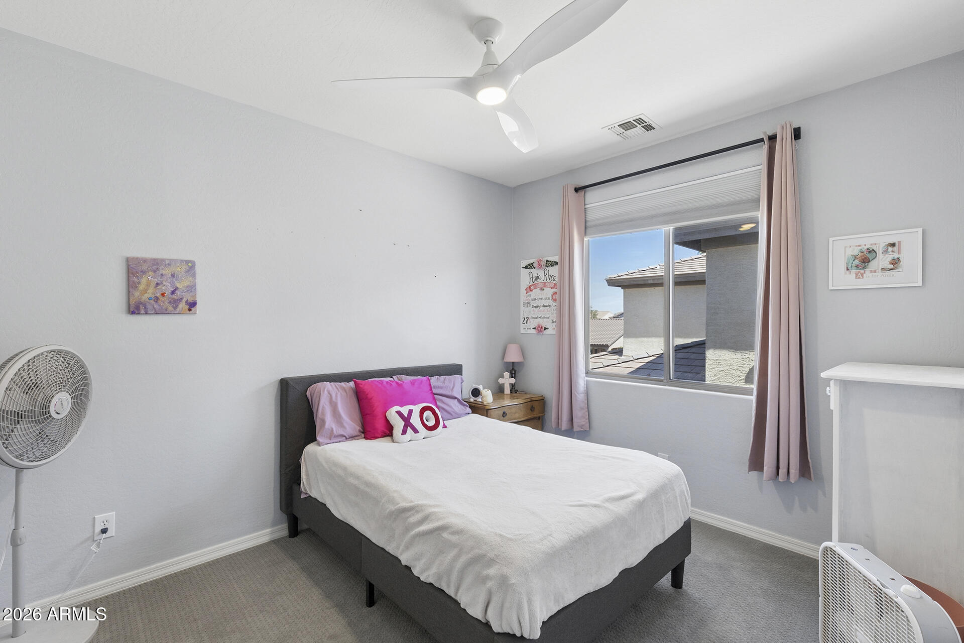 6848 West Ridgeline Road Peoria, AZ 85383 - Photo 46 of 71 a bedroom with a bed and a window