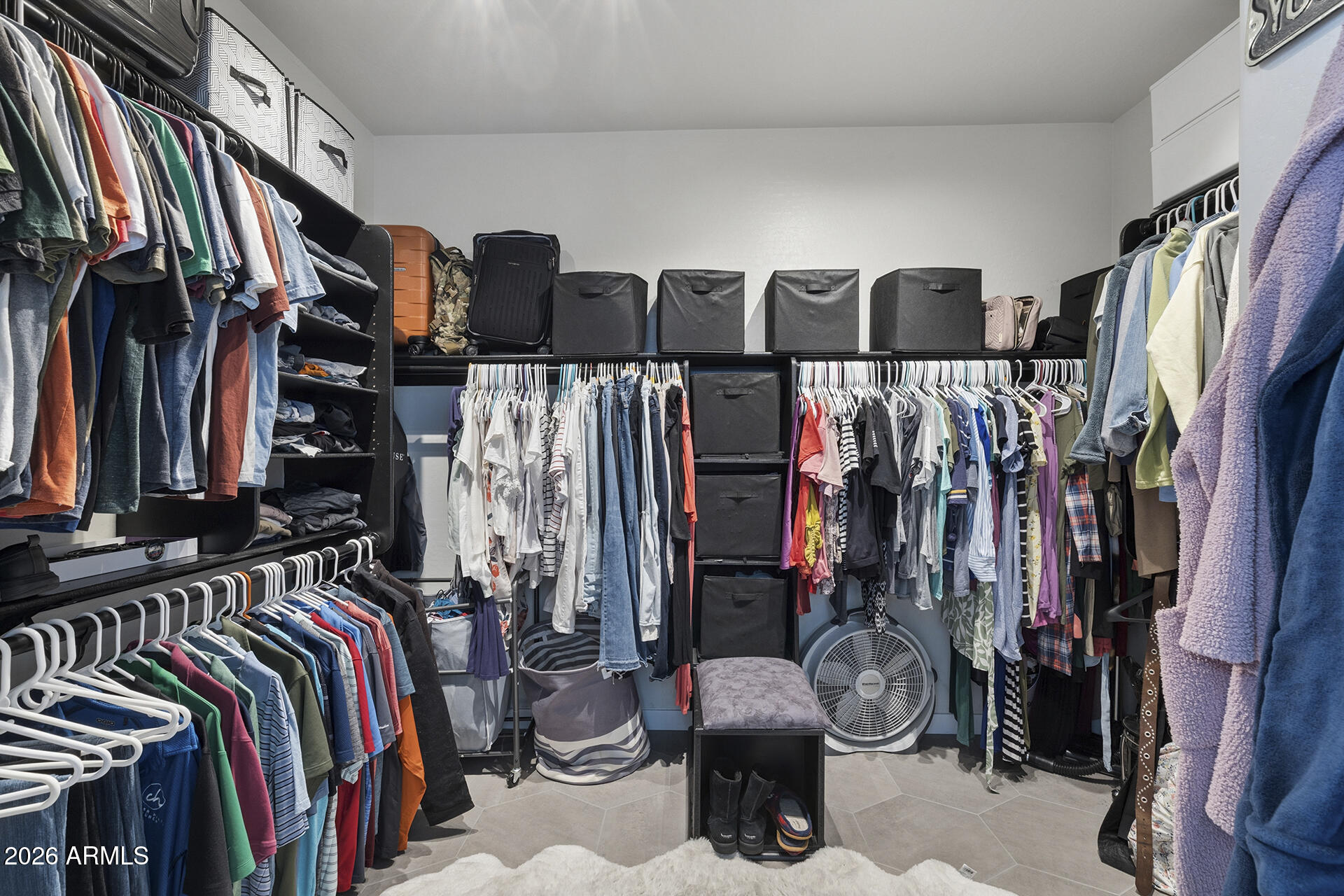 6848 West Ridgeline Road Peoria, AZ 85383 - Photo 58 of 71 a view of walk in closet with clothes and shoes