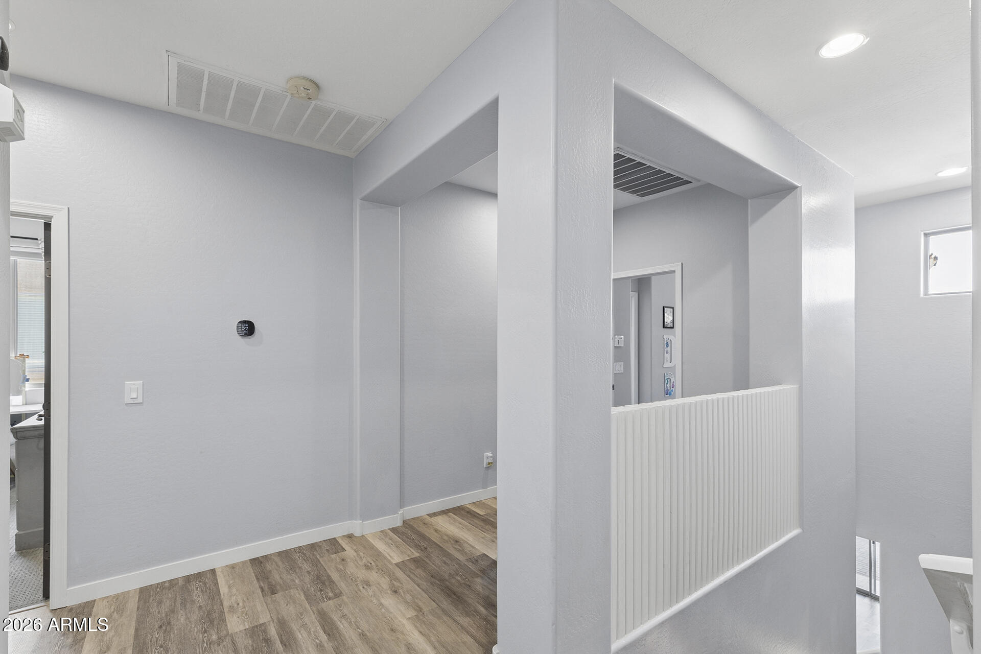 6848 West Ridgeline Road Peoria, AZ 85383 - Photo 60 of 71 a view of hallway with closet and wooden floor