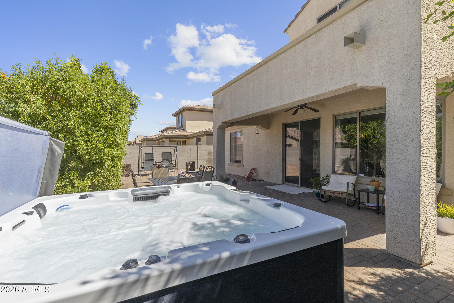 6848 West Ridgeline Road Peoria, AZ 85383 - Photo 63 of 71 a view of a house with backyard porch and sitting area