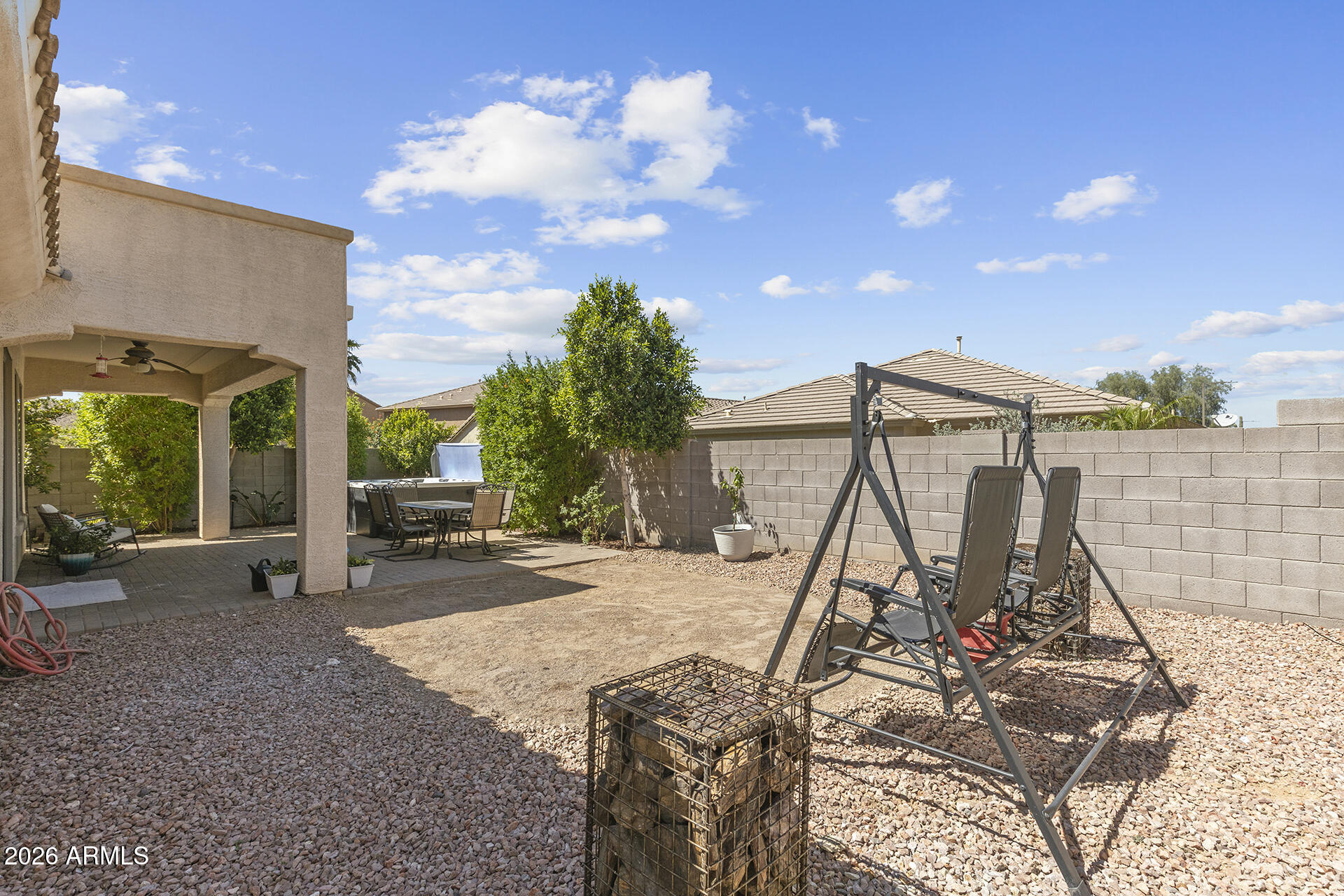 6848 West Ridgeline Road Peoria, AZ 85383 - Photo 66 of 71 a view of a house with backyard and porch
