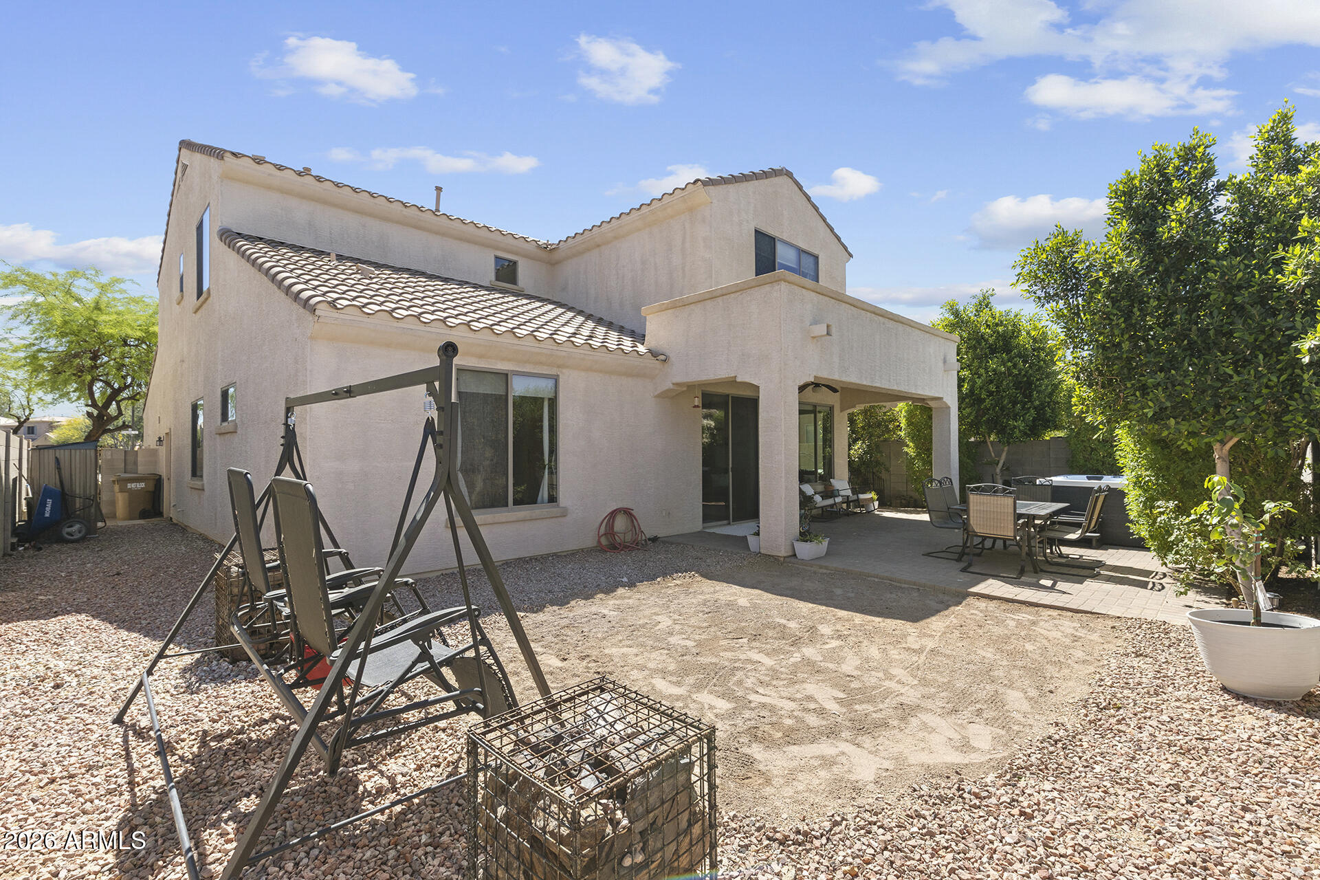 6848 West Ridgeline Road Peoria, AZ 85383 - Photo 67 of 71 a view of a house with backyard and sitting area