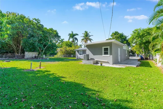 a view of a house with a swimming pool