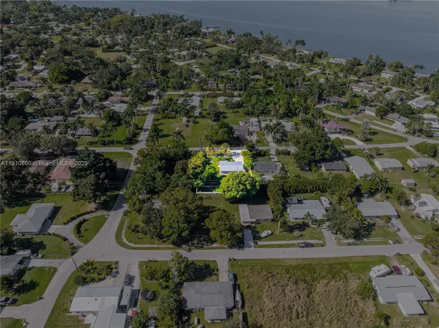 an aerial view of residential house with outdoor space
