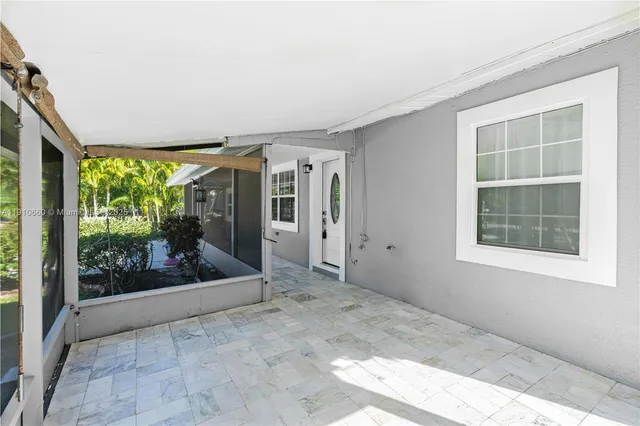 a view of a room with a large window