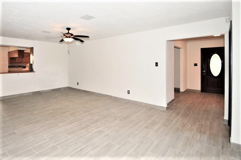 2004 Sleepy Hollow Drive Pearland, TX 77581 - Photo 6 of 13 a view of a room with wooden floor