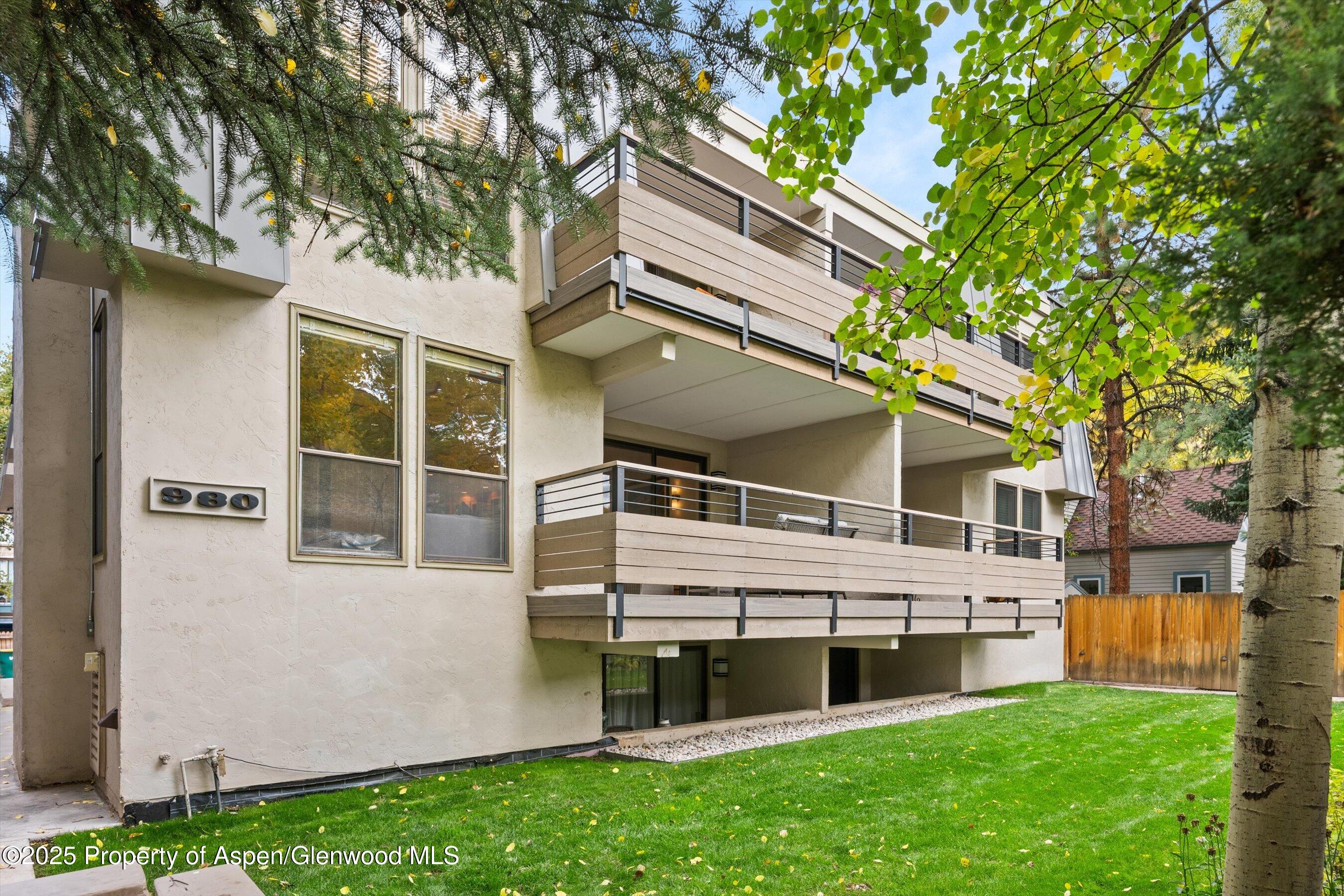 980 East Hyman Avenue, Unit 3 Aspen, CO 81611 - Photo 25 of 26 a view of house with a yard