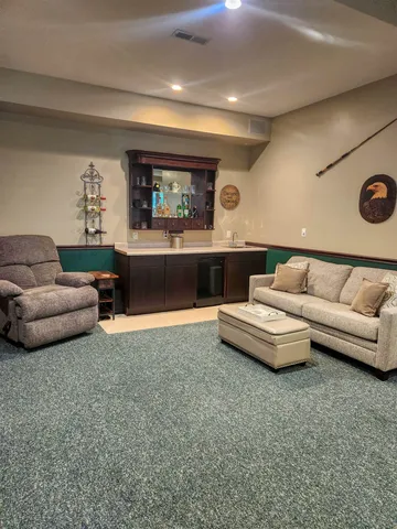 a living room with furniture and a couch