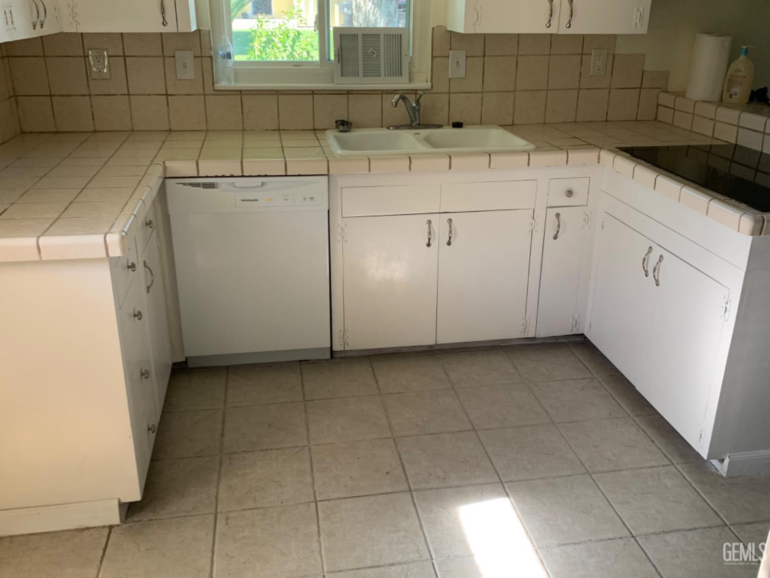 Undisclosed Address Bakersfield, CA 93306 - Photo 11 of 18 a utility room with dryer and washer