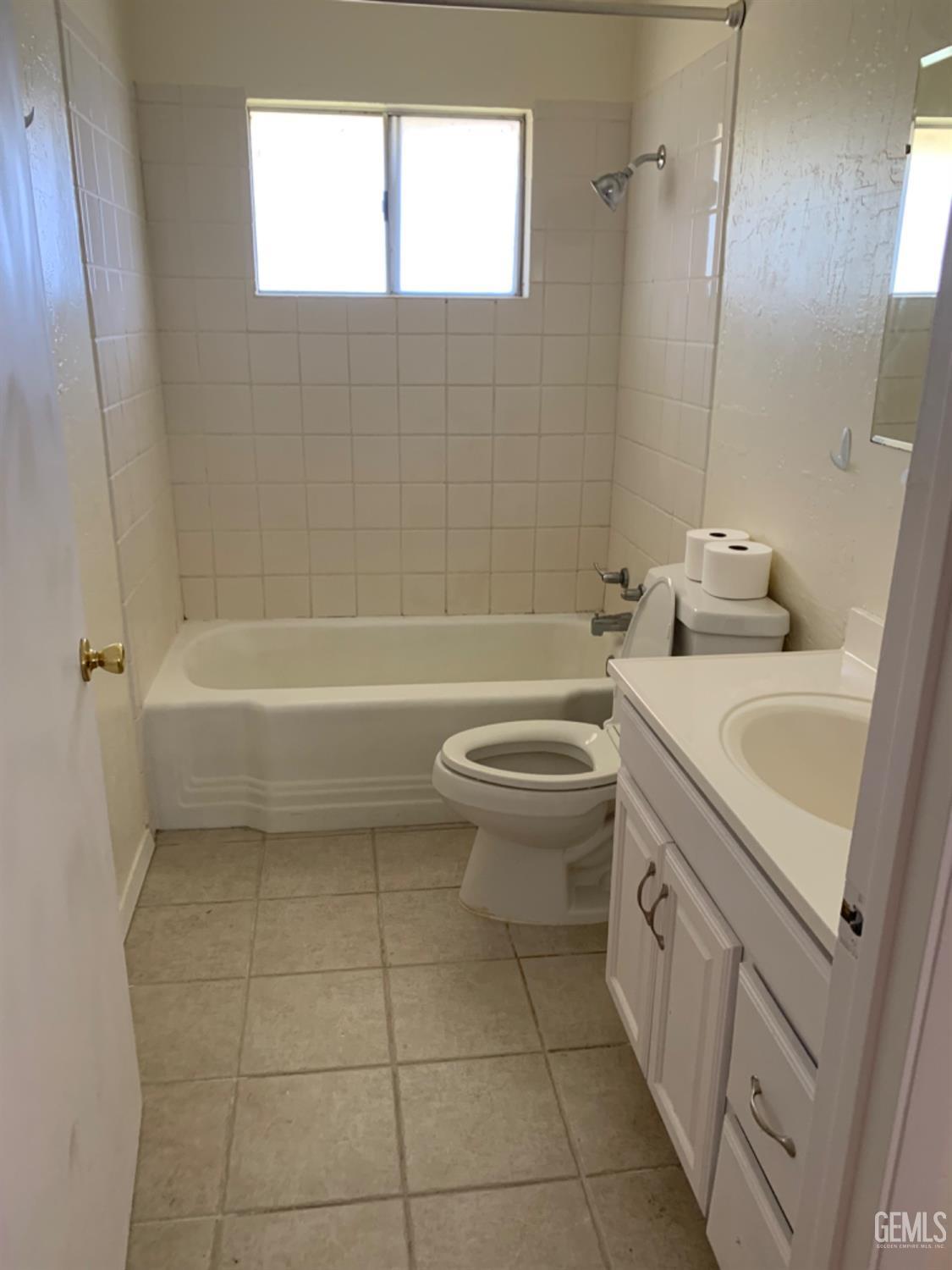 Undisclosed Address Bakersfield, CA 93306 - Photo 15 of 18 a bathroom with a sink a toilet and bathtub