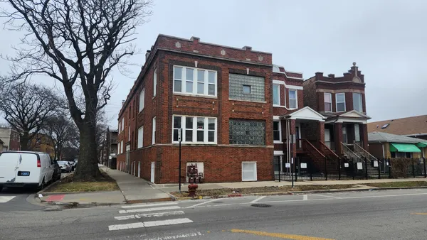 a view of a building and a street