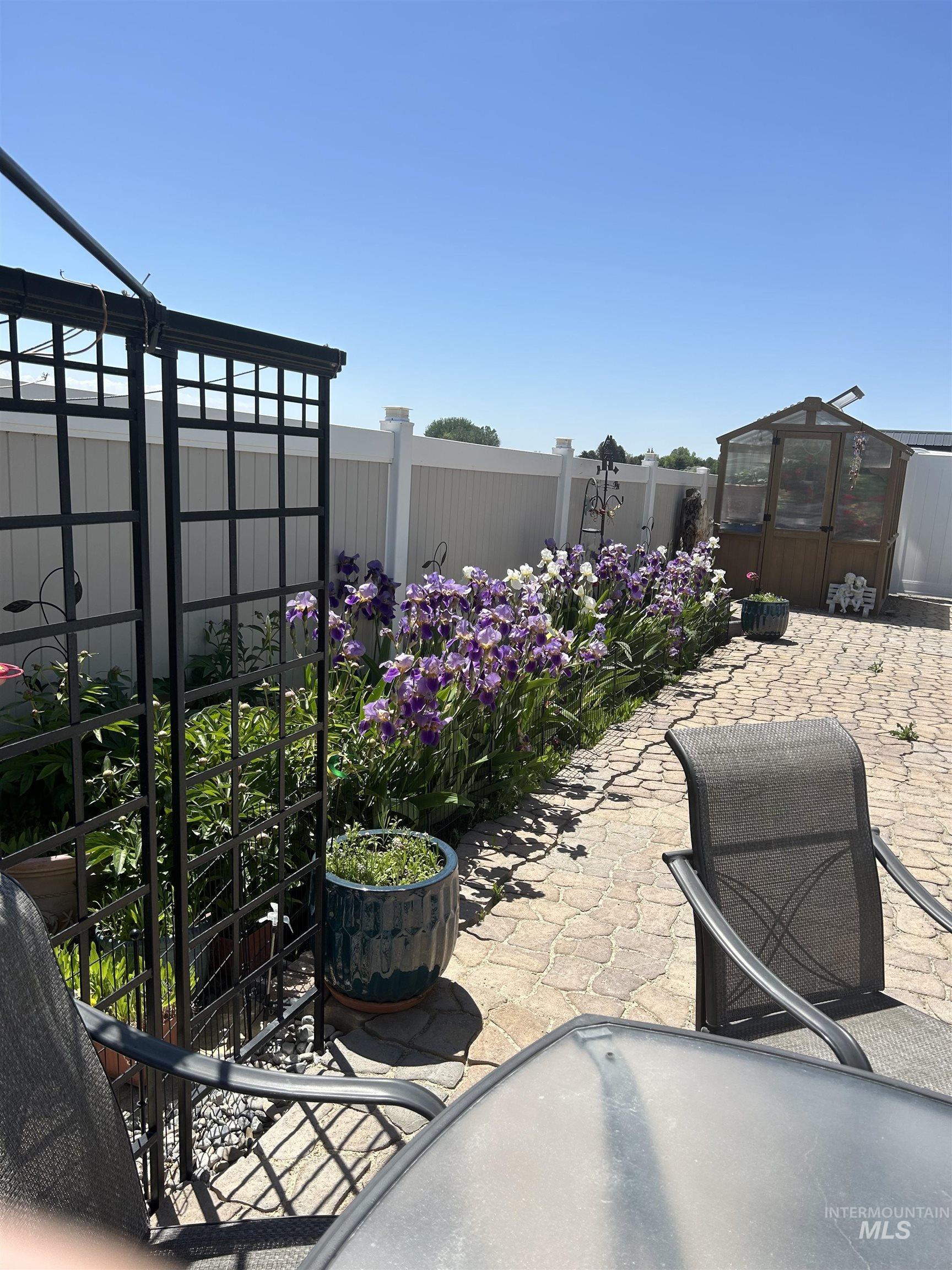 764 Heidi Terrace Kimberly, ID 83341 - Photo 18 of 42 Fenced backyard with an exterior structure, an outbuilding, and a patio