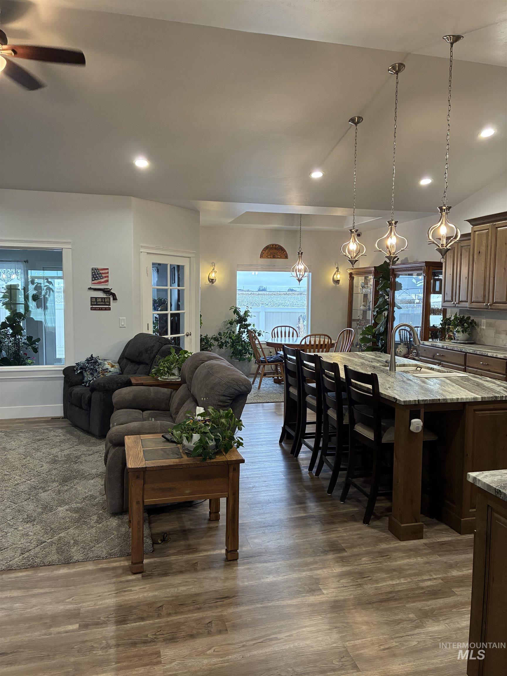764 Heidi Terrace Kimberly, ID 83341 - Photo 33 of 42 Living area featuring recessed lighting, dark wood-style floors, a ceiling fan, and vaulted ceiling