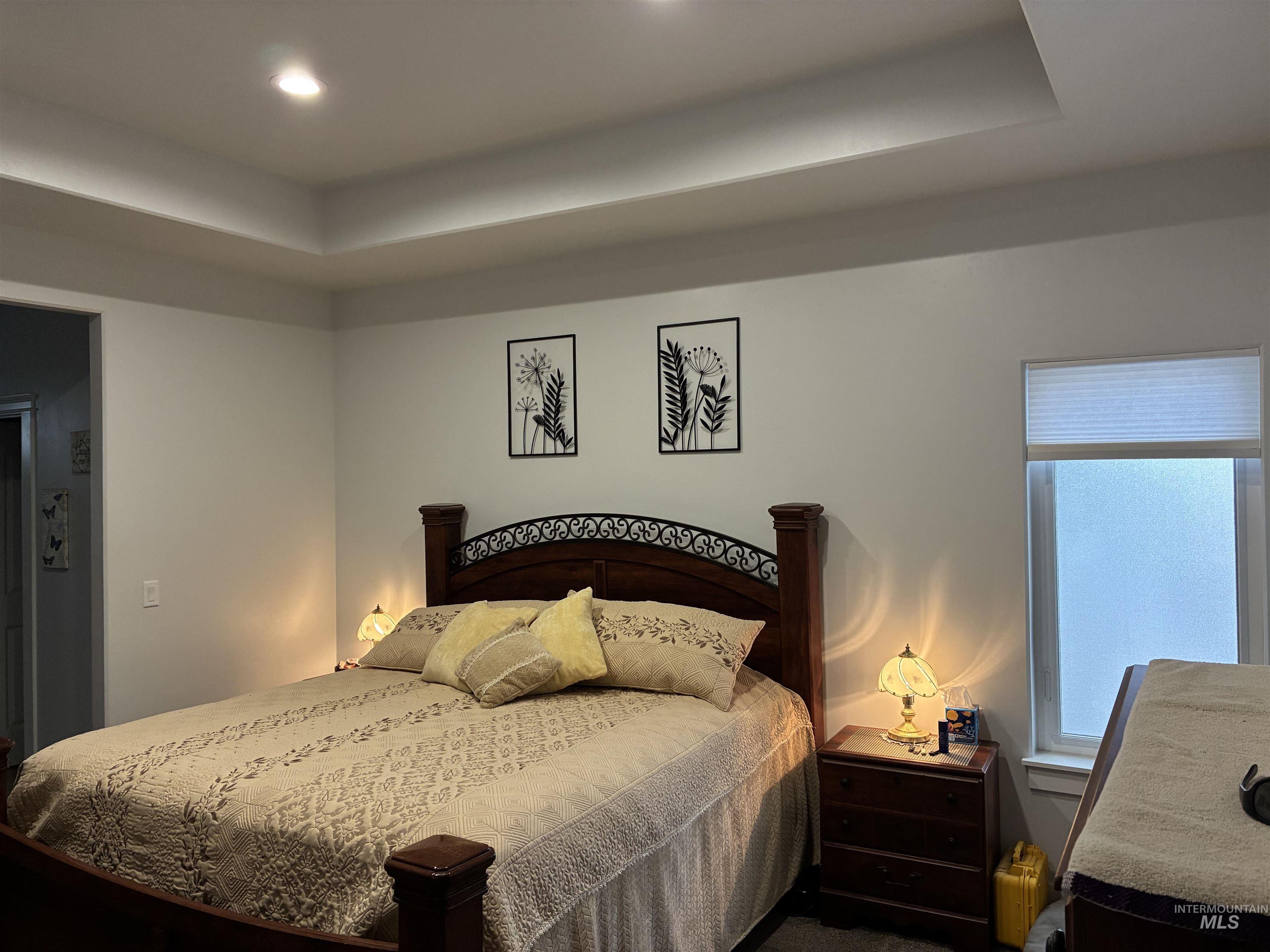 764 Heidi Terrace Kimberly, ID 83341 - Photo 35 of 42 Bedroom with a tray ceiling and recessed lighting