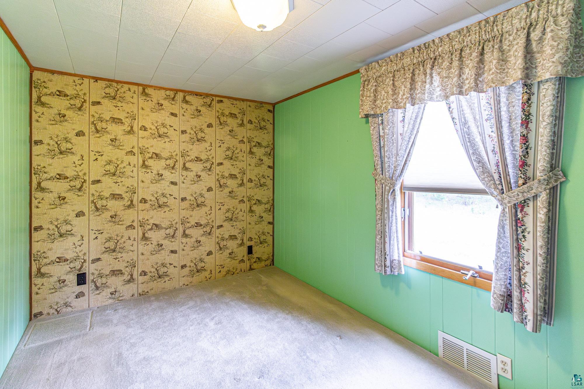 1775 Lookout Road Ely, MN 55731 - Photo 12 of 44 Empty room featuring carpet flooring