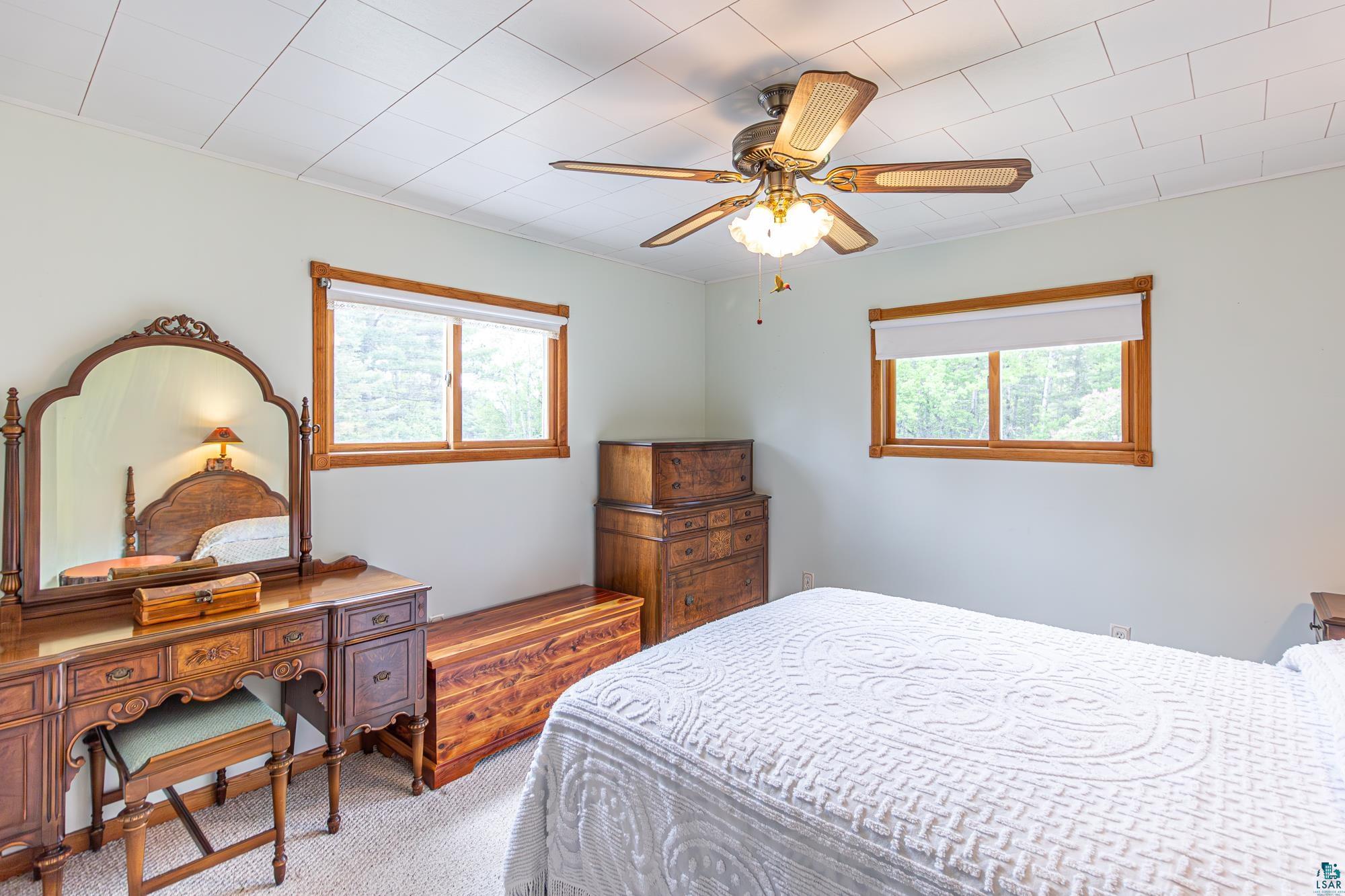 1775 Lookout Road Ely, MN 55731 - Photo 21 of 44 Carpeted bedroom with ceiling fan
