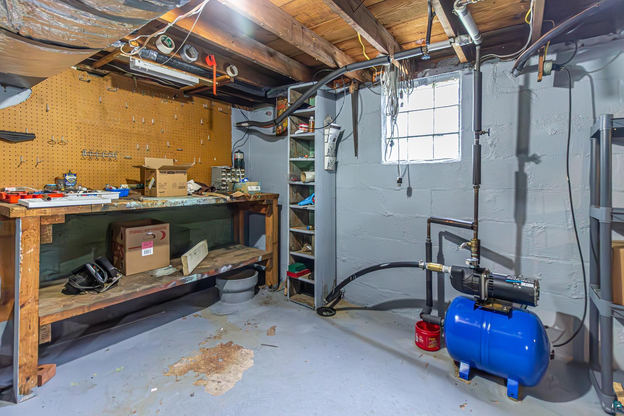 1775 Lookout Road Ely, MN 55731 - Photo 29 of 44 Basement with a workshop area