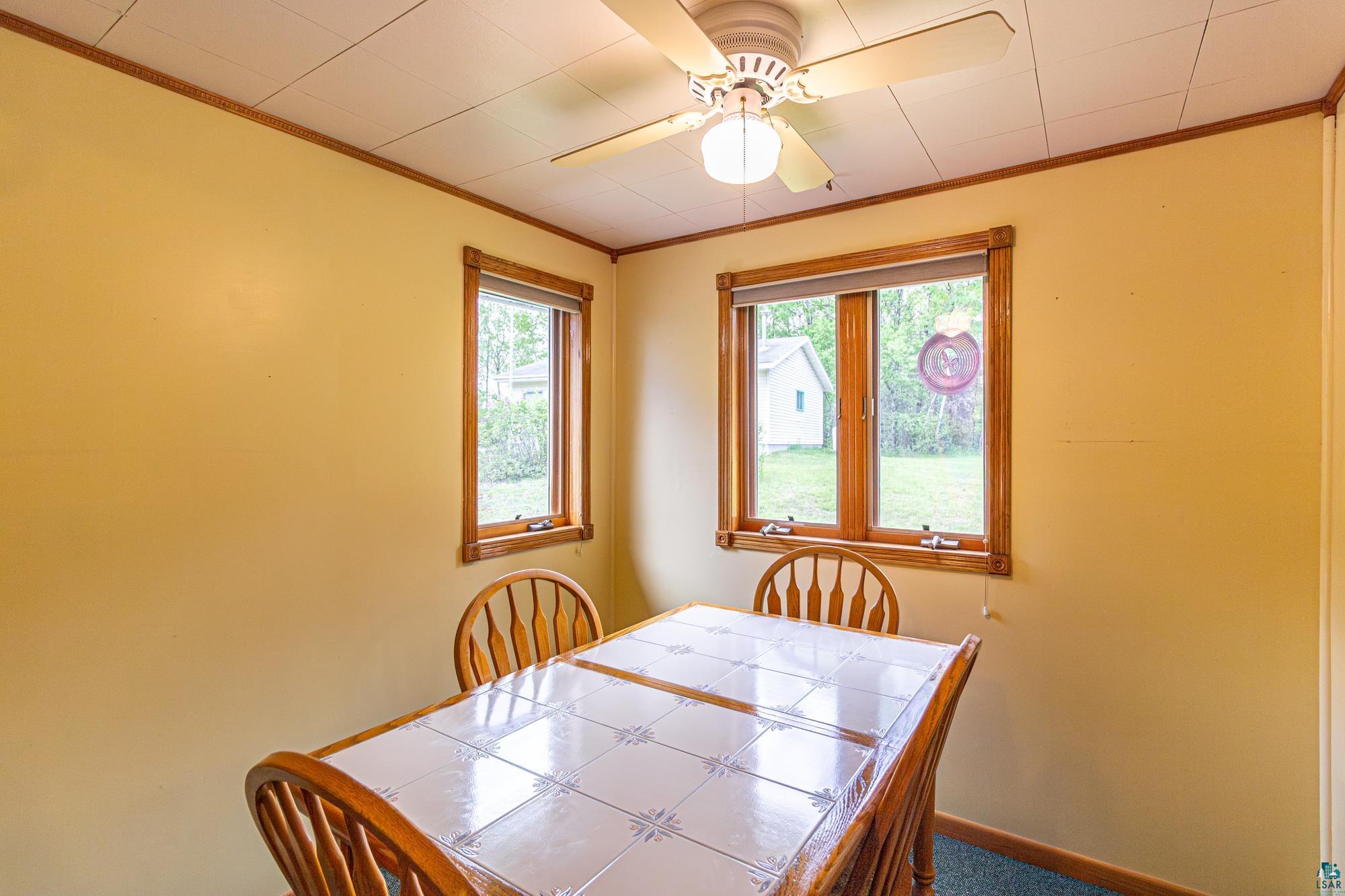Dining space with ceiling fan