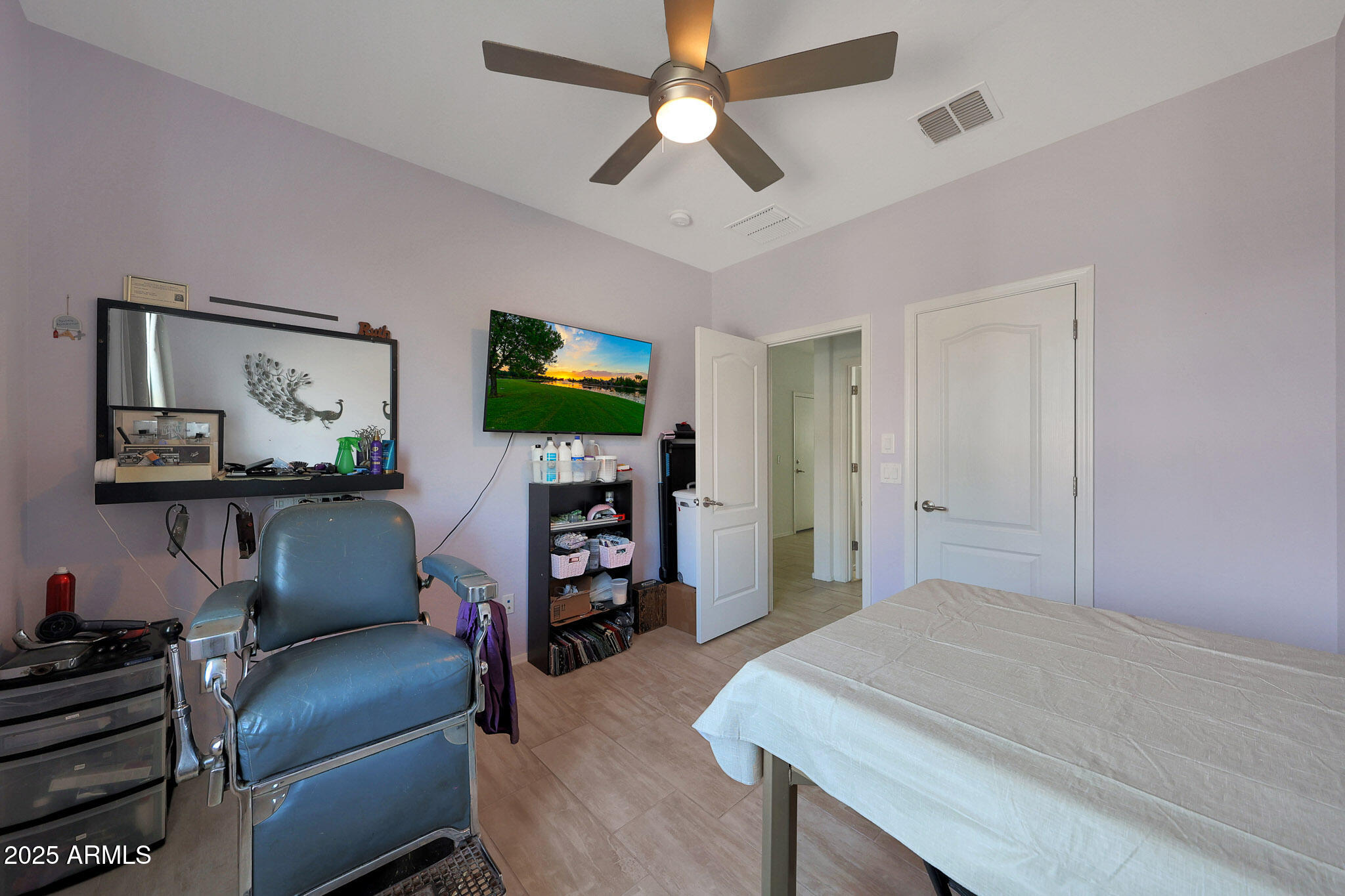 3446 North Mayfair Mesa, AZ 85213 - Photo 11 of 49 a living room with furniture and a flat screen tv