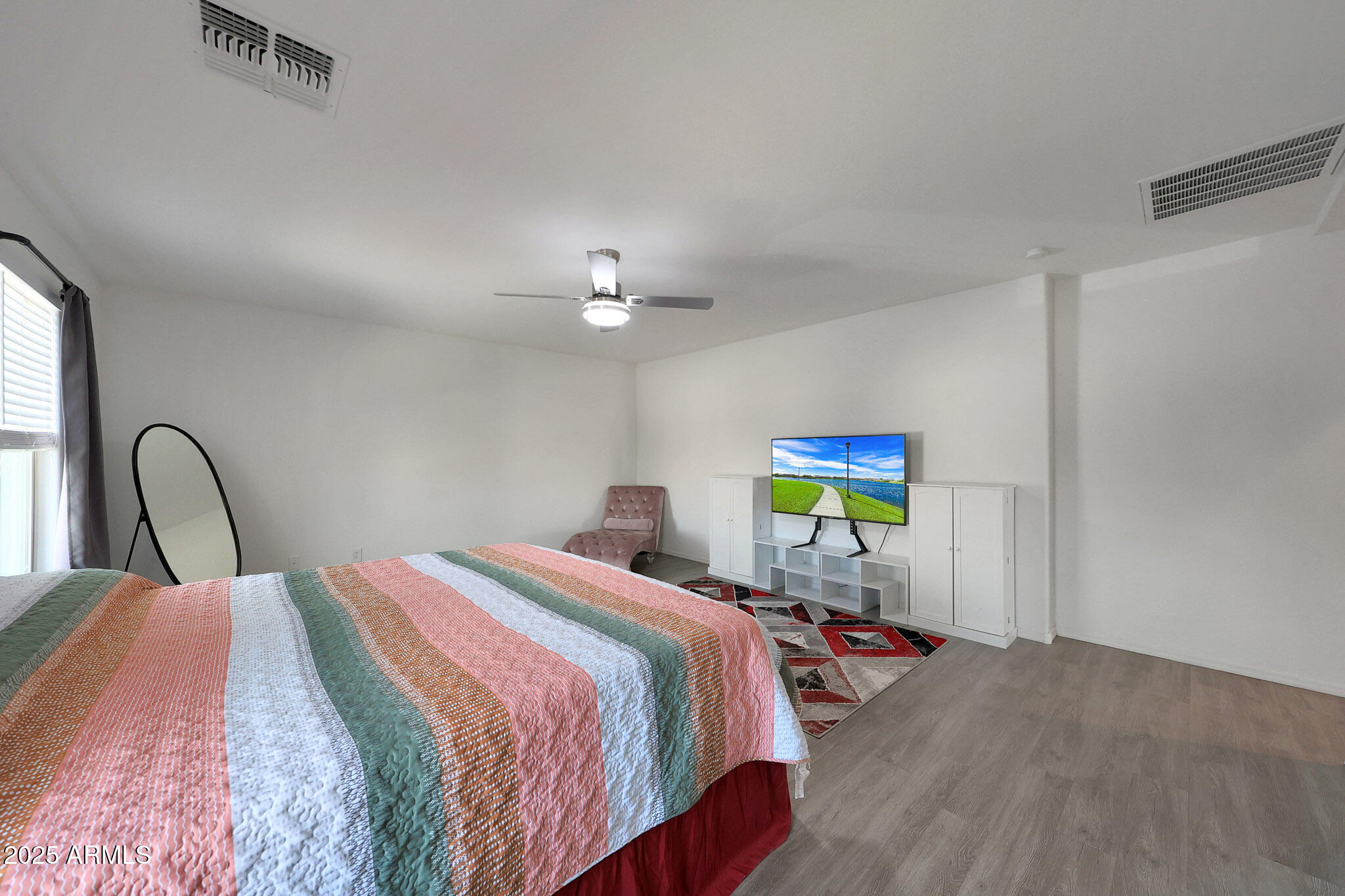3446 North Mayfair Mesa, AZ 85213 - Photo 26 of 49 a bed room with a bed and a chair