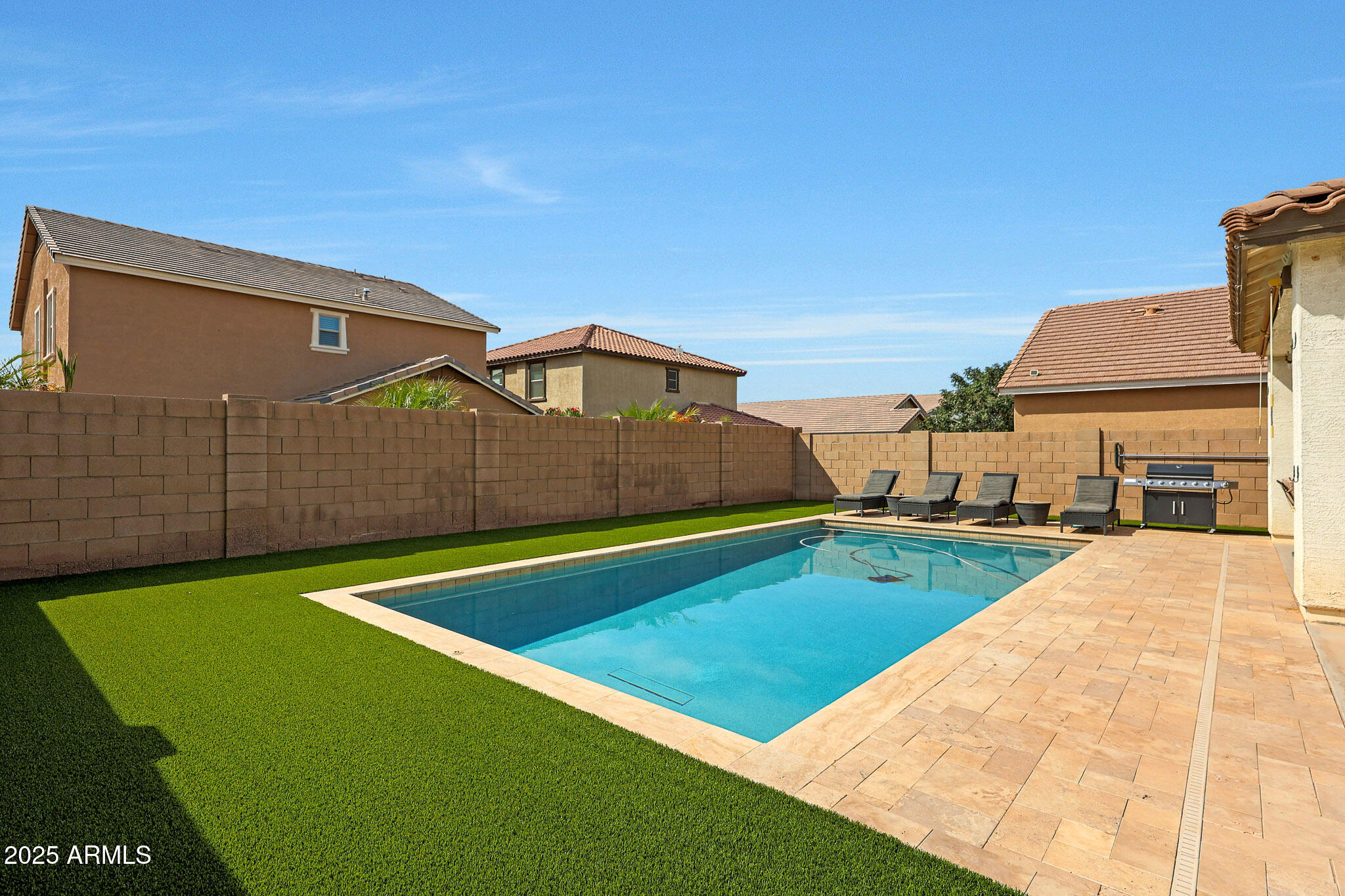 3446 North Mayfair Mesa, AZ 85213 - Photo 37 of 49 a front view of a house with swimming pool