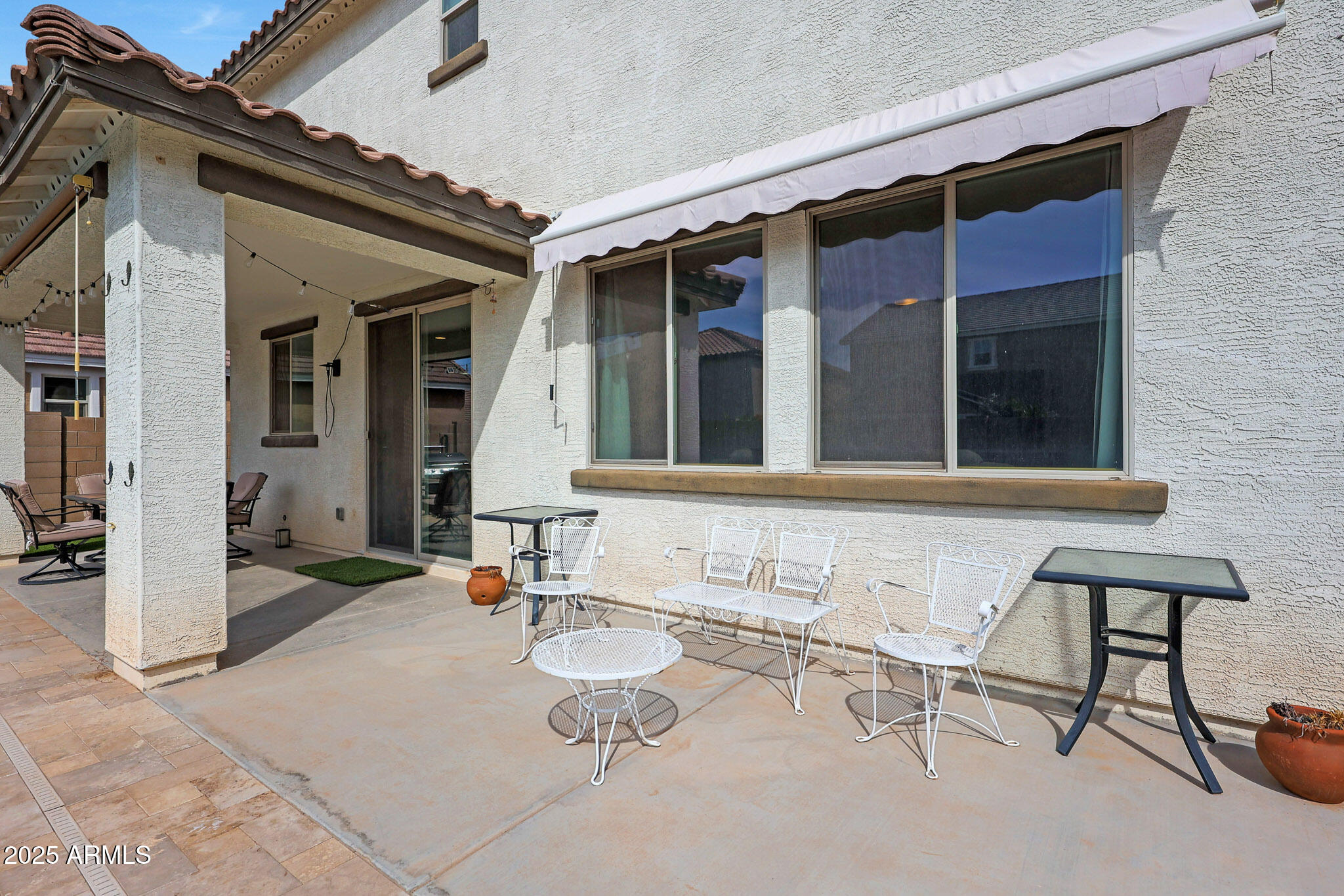 3446 North Mayfair Mesa, AZ 85213 - Photo 46 of 49 front view of a house with table and chairs