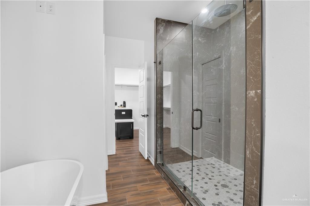 3701 South Solstice Road Edinburg, TX 78542 - Photo 11 of 17 a bathroom with a shower and a sink