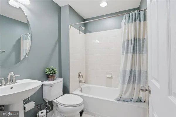 a view of a wooden chairs and table in the balcony