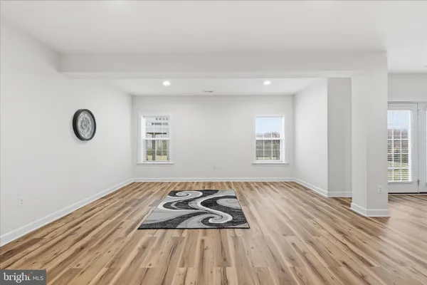 a view of a big house with many windows