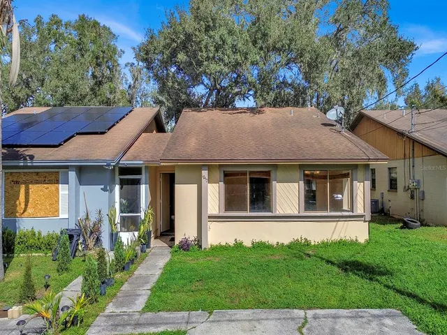 front view of a house with a yard