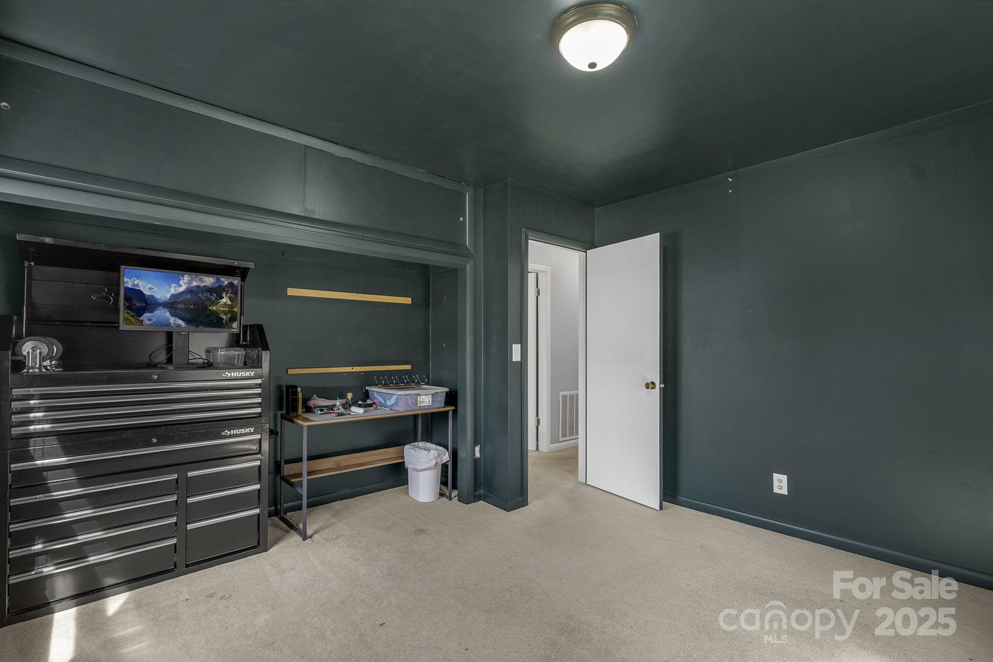 110 Cannon Drive Hendersonville, NC 28792 - Photo 26 of 36 a view of room and workspace