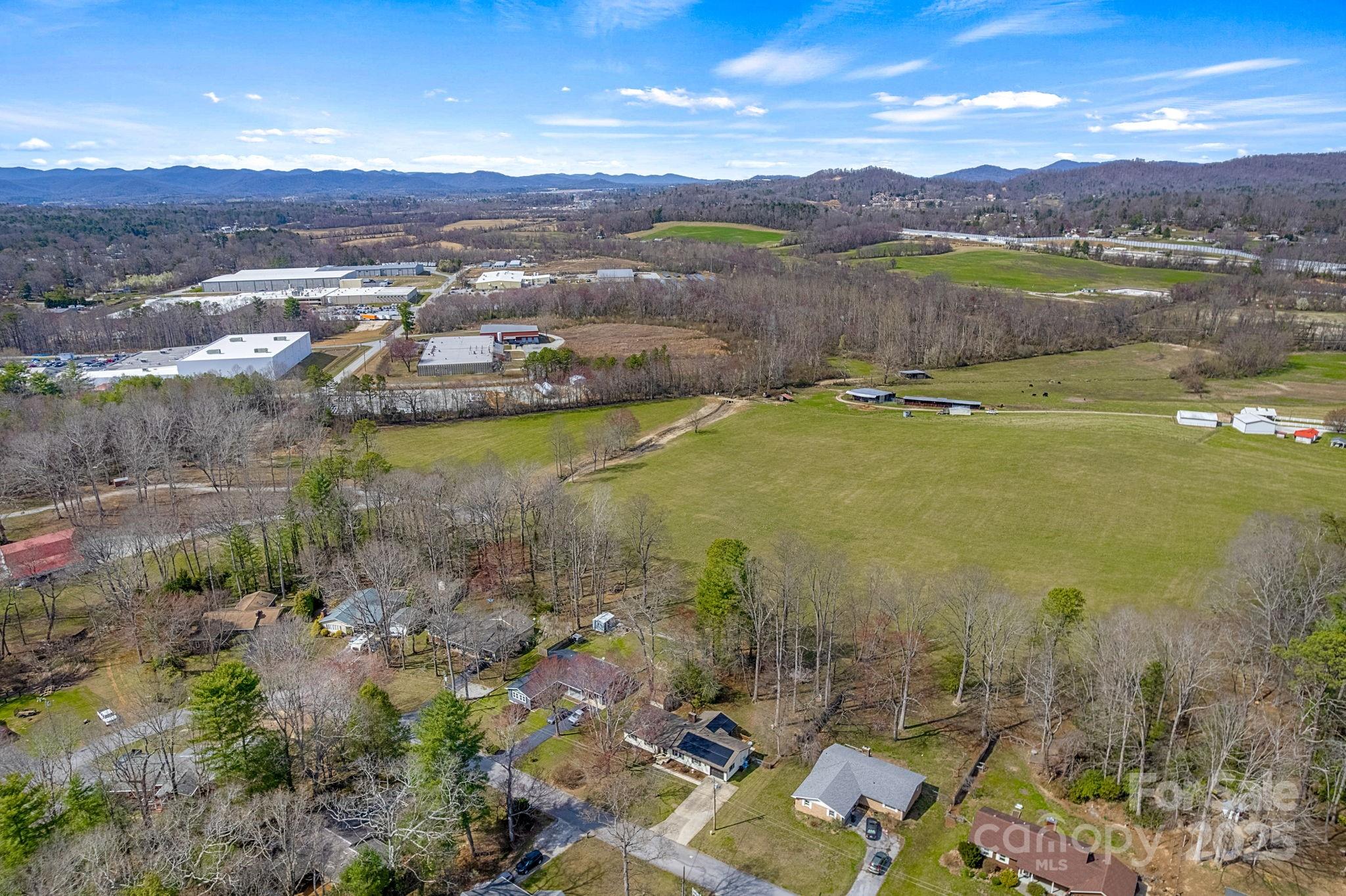 110 Cannon Drive Hendersonville, NC 28792 - Photo 35 of 36 a view of a lake with mountains in the background