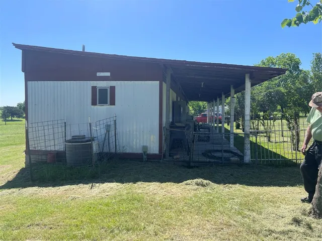 a view of a garden with an outdoor space