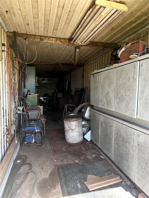 0 Holland Road Forestburg, TX 76239 - Photo 24 of 38 a room with water heater and outdoor space