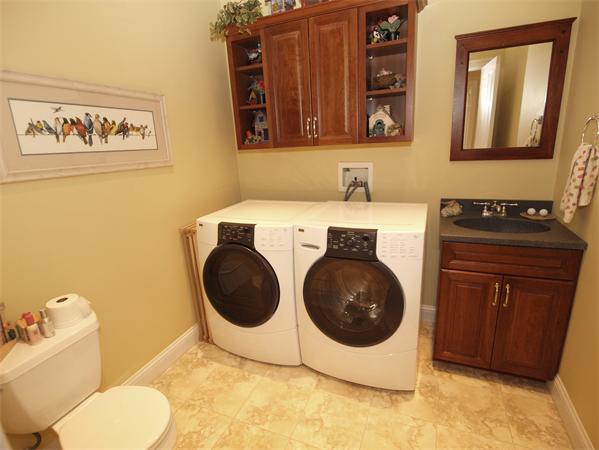 64 Osgood Road Sterling, MA 01564 - Photo 13 of 30 a utility room with sink dryer and washer