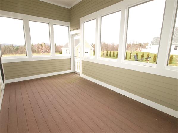 64 Osgood Road Sterling, MA 01564 - Photo 14 of 30 a view of an empty room with wooden floor and a window