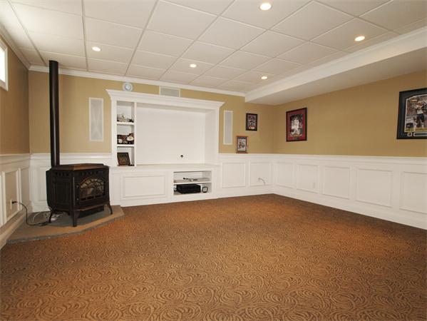 64 Osgood Road Sterling, MA 01564 - Photo 23 of 30 a view of an empty room with a fireplace