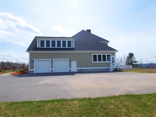 64 Osgood Road Sterling, MA 01564 - Photo 28 of 30 a front view of a house with a yard and ocean view