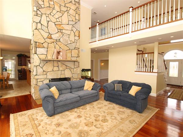 64 Osgood Road Sterling, MA 01564 - Photo 7 of 30 a living room with furniture and a rug