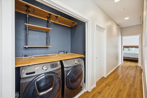 a utility room with dryer and washer