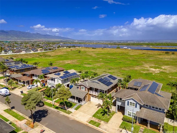 a view of a city with an ocean view