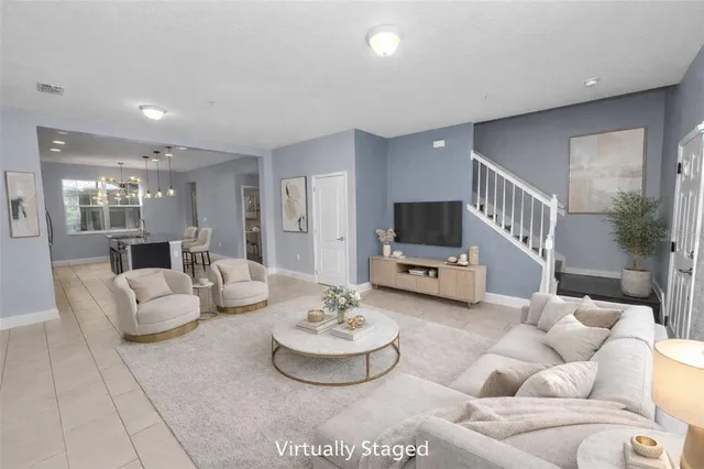 a living room with furniture and a table