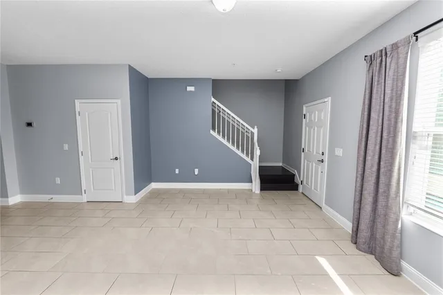 a kitchen with granite countertop stainless steel appliances and cabinets