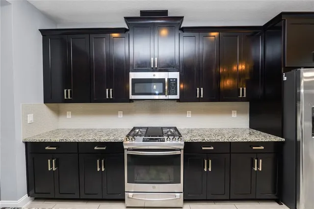 a view of a big room with a chandelier