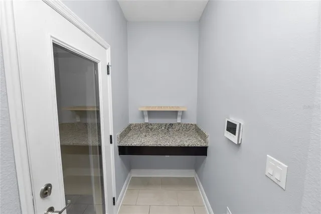 a front view of a house with a garage