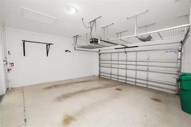 an aerial view of a houses with outdoor space